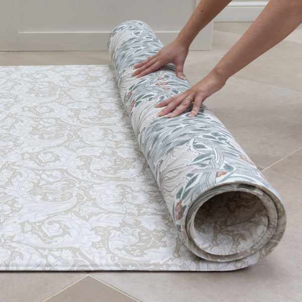 rolled neutral floor mat from totter and tumble with william morris maximalist designs