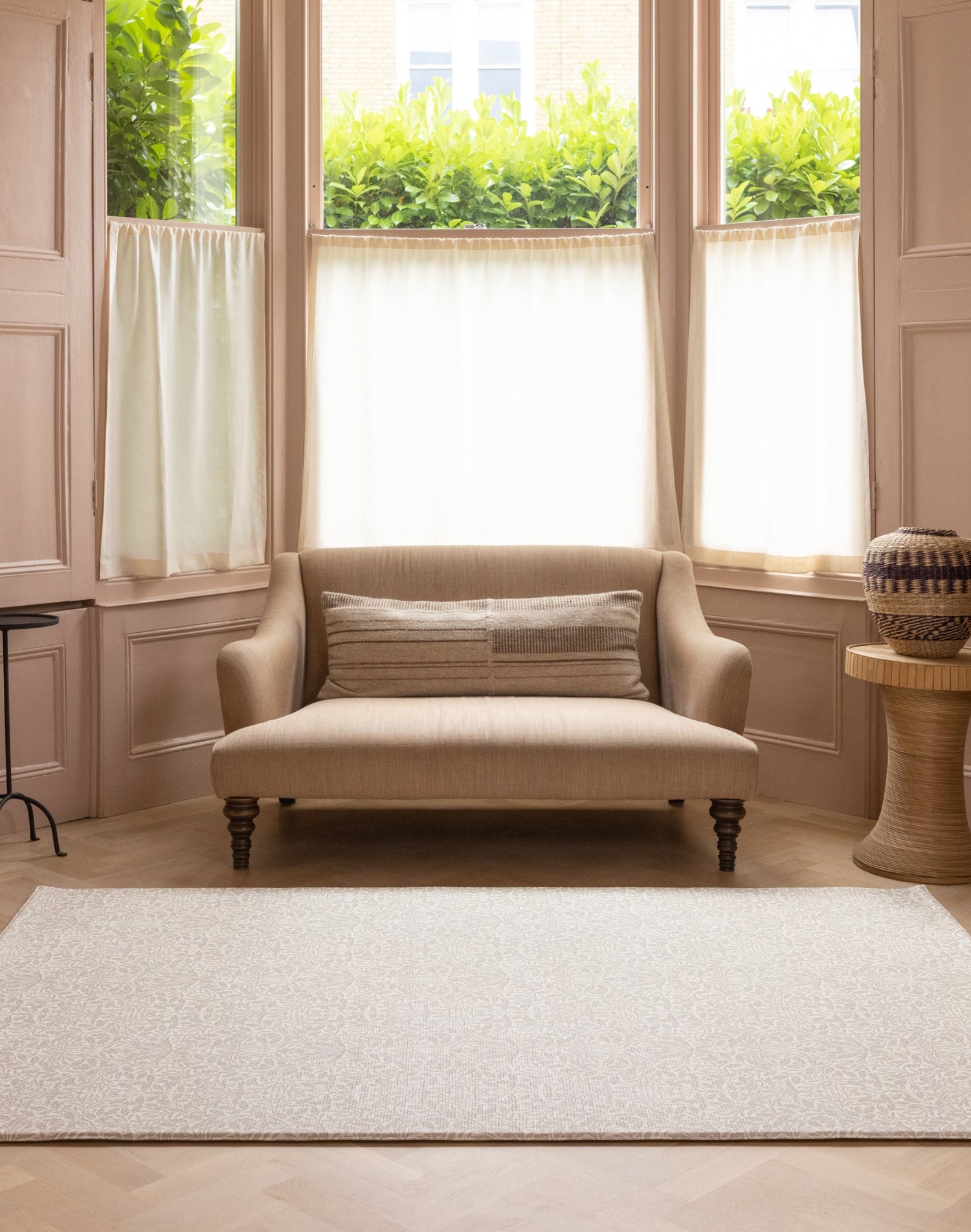 Totter + Tumble’s Acorn Playmat styled in a design-conscious living room - blending heritage prints with modern classic interiors for elegant family spaces.