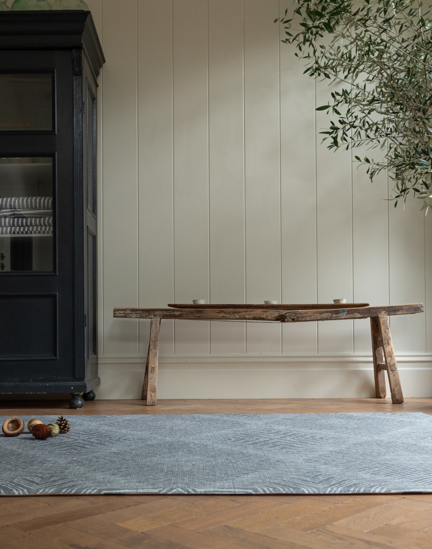 Beautiful grey play mat designed to complement modern family homes with a rug like aesthetic