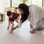 Mum and child play on The Brecon, a large baby play mat perfect for toddlers and newborns alike.