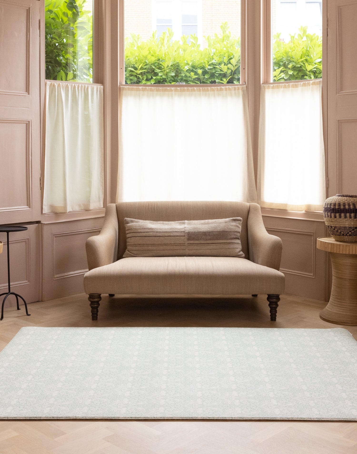 The Brer Rabbit Playmat placed in a living space. A functional and stylish decor that aligns with the curved furniture trend and neutral home design.