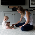 brer rabbit playmat with mum and baby playing sitting practise on floor protective padded play rug that is soft and comfortable for babies development, one piece and easy to clean playmat