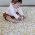 baby playing on play mat rug. morris & co playmats like totter and tumble are wipeable, easy to clean foam play mat padded to protect your little one from tumbling and the floor underneath.