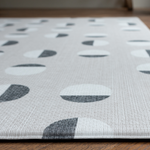 Close up of textured baby play mat with a modern polka design for a stylish effect