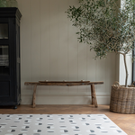 Monochrome play mat with organic polka design that complements contemporary family homes