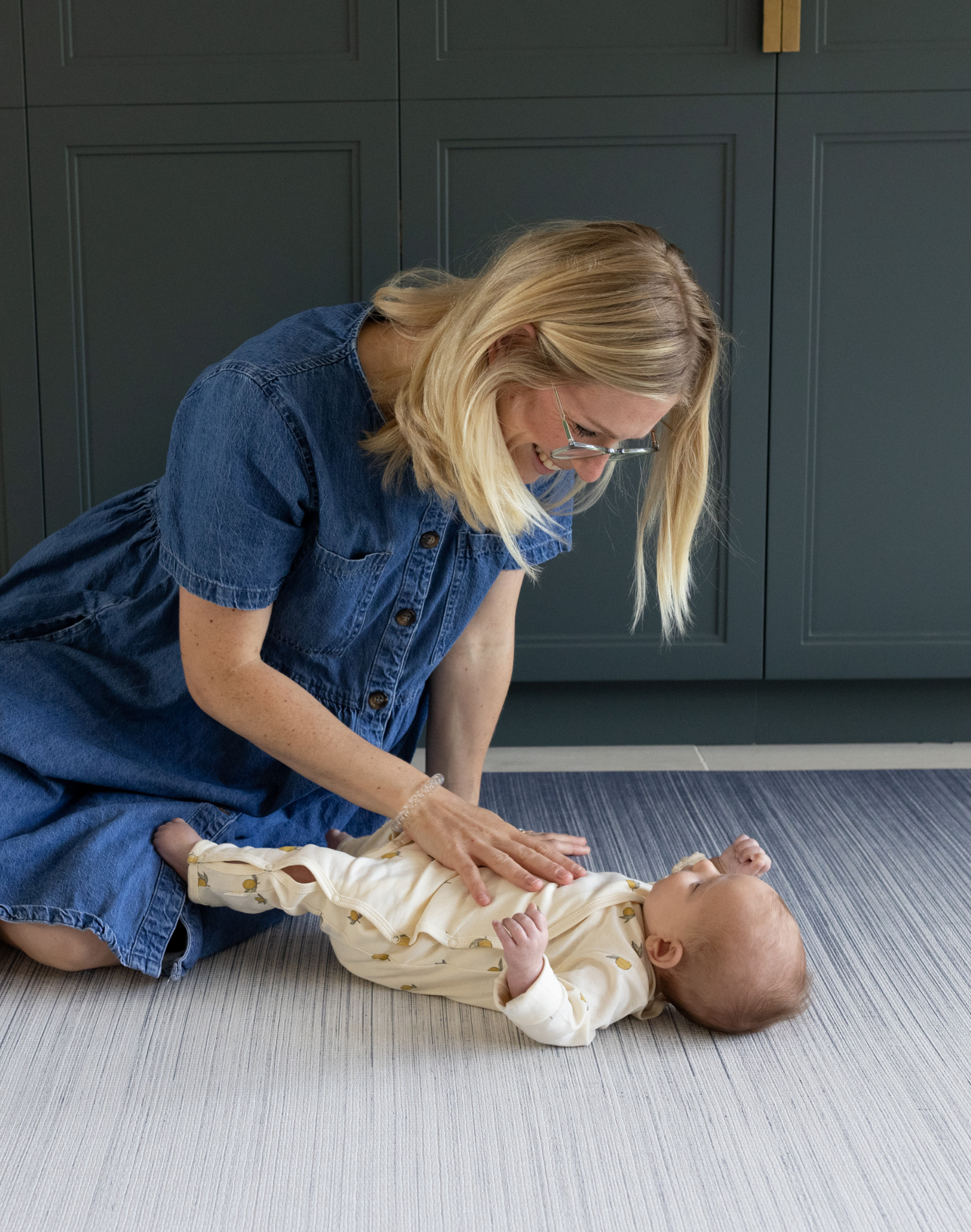 Mum and baby enjoying Ombre blue baby play mat made for support on the floor perfect for tummy time and playing stylish design looks great in modern interiors