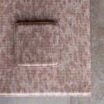 Corner of animal print playmat with swatch available to order so you can feel the quality and see the colour and pattern against your home furnishings
