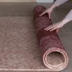 Unrolling reversible one piece playmat the Rusa and Merah with two timeless designs to complement modern interiors thick memory foam provides protection on hard flooring