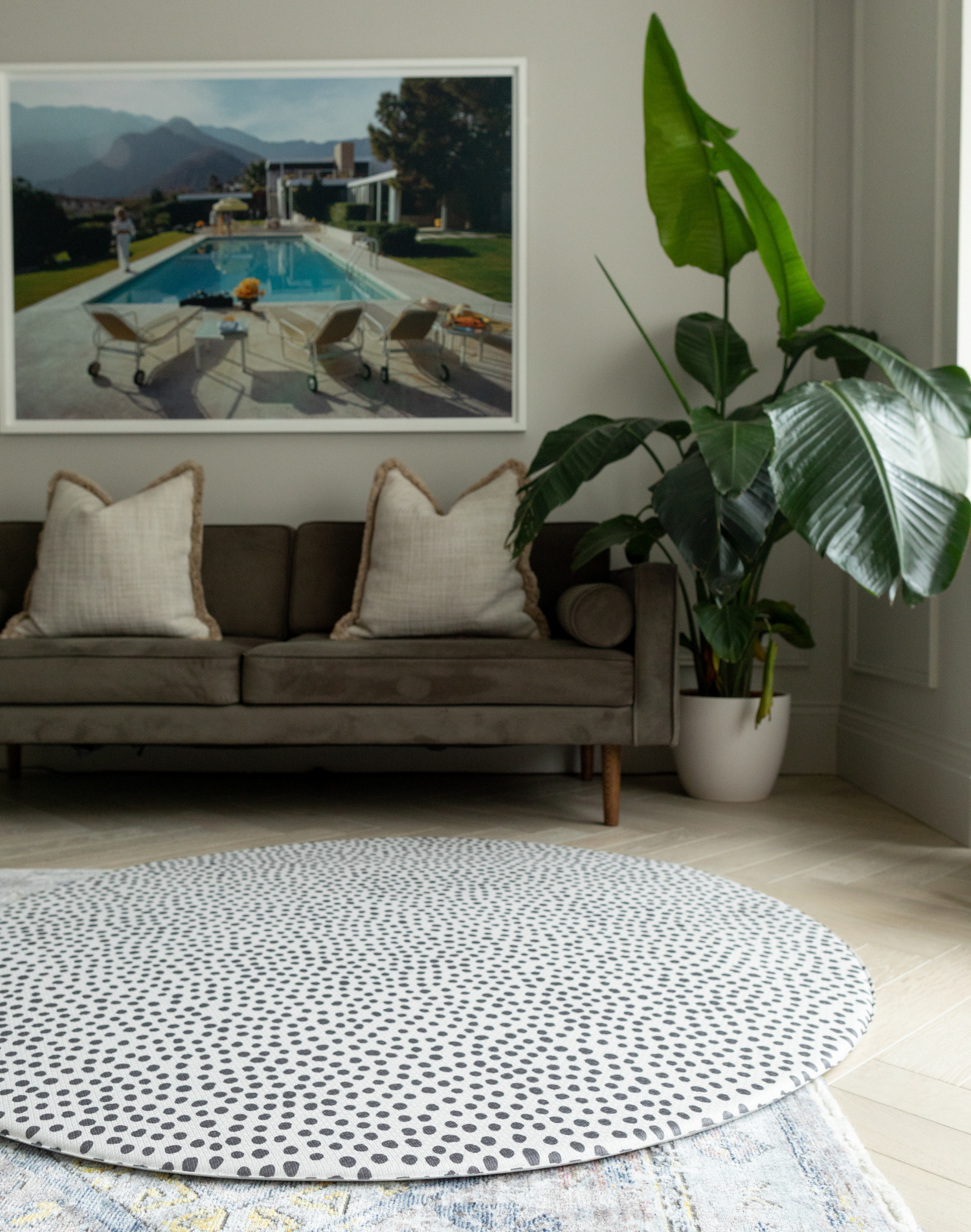 Extra large round kids playmat sits stylishly in a modern family living space