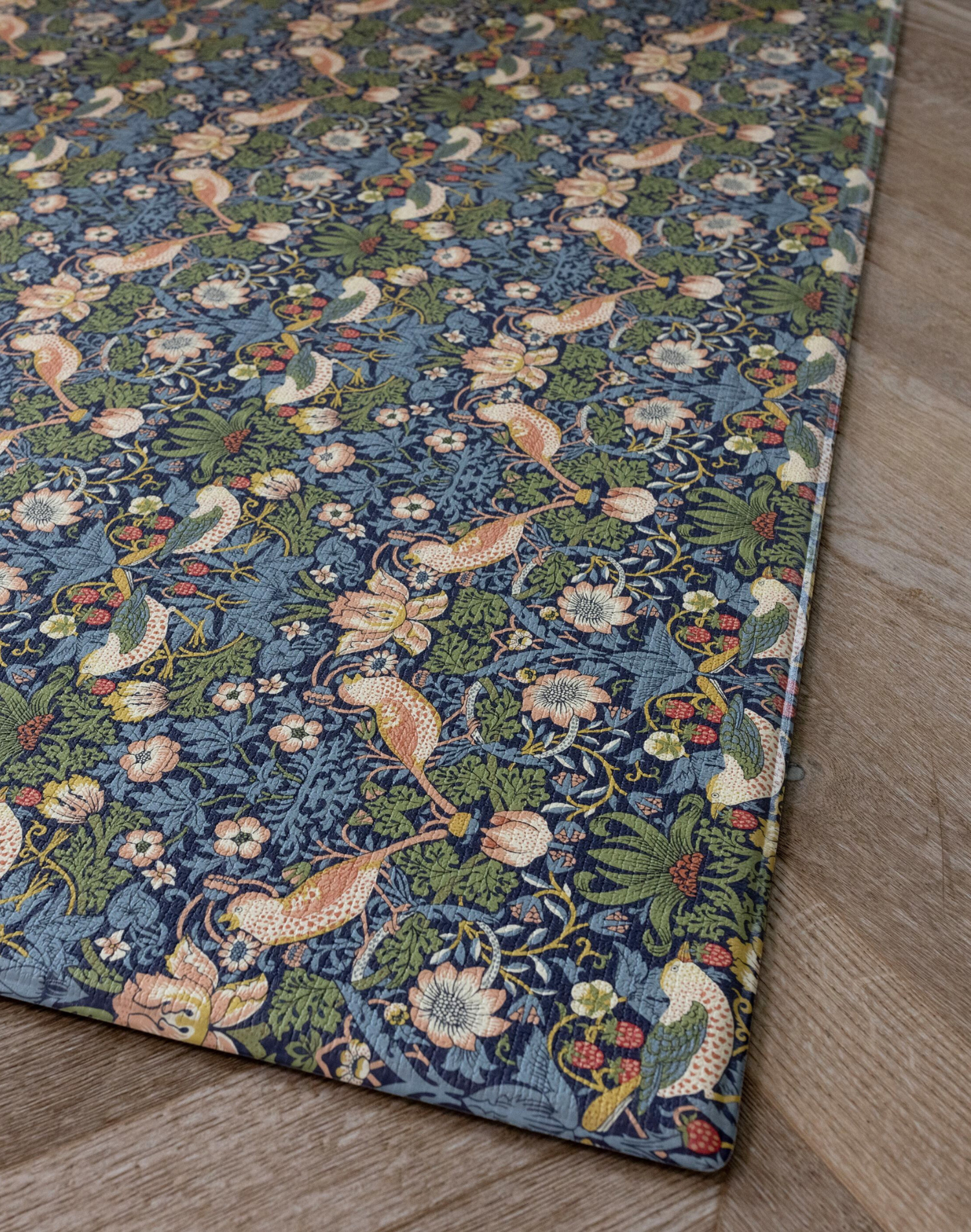 close up design totter + tumble best toddler playmats, padded play in morris & co strawberry thief padded play mat that suits your interior style and nursery decor. Intricate design and pattern from heritage British designer. Playmat that looks like a padded playmat rug