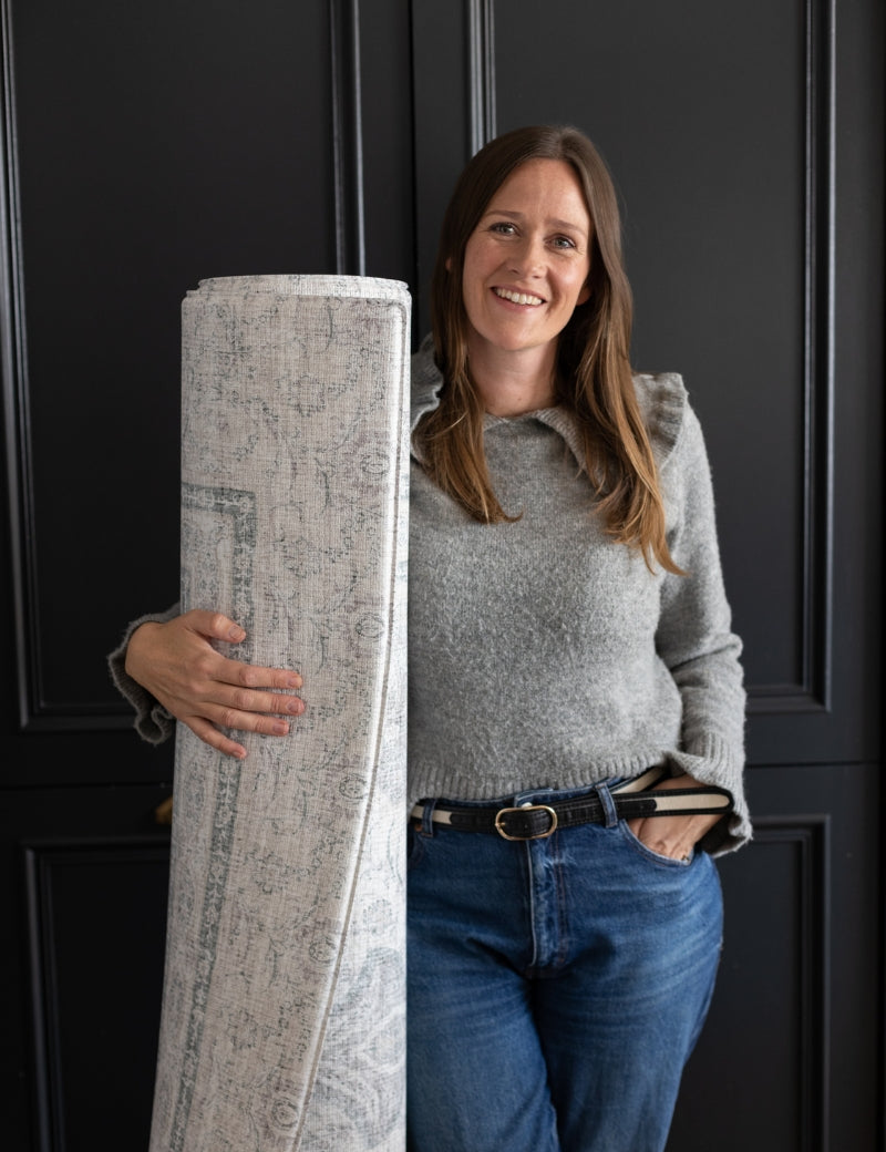 Susie Stubbs, founder of Totter + Tumble with an extra large play mat