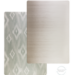 Double sided neutral playmat with ikat inspired motifs for a textile effect