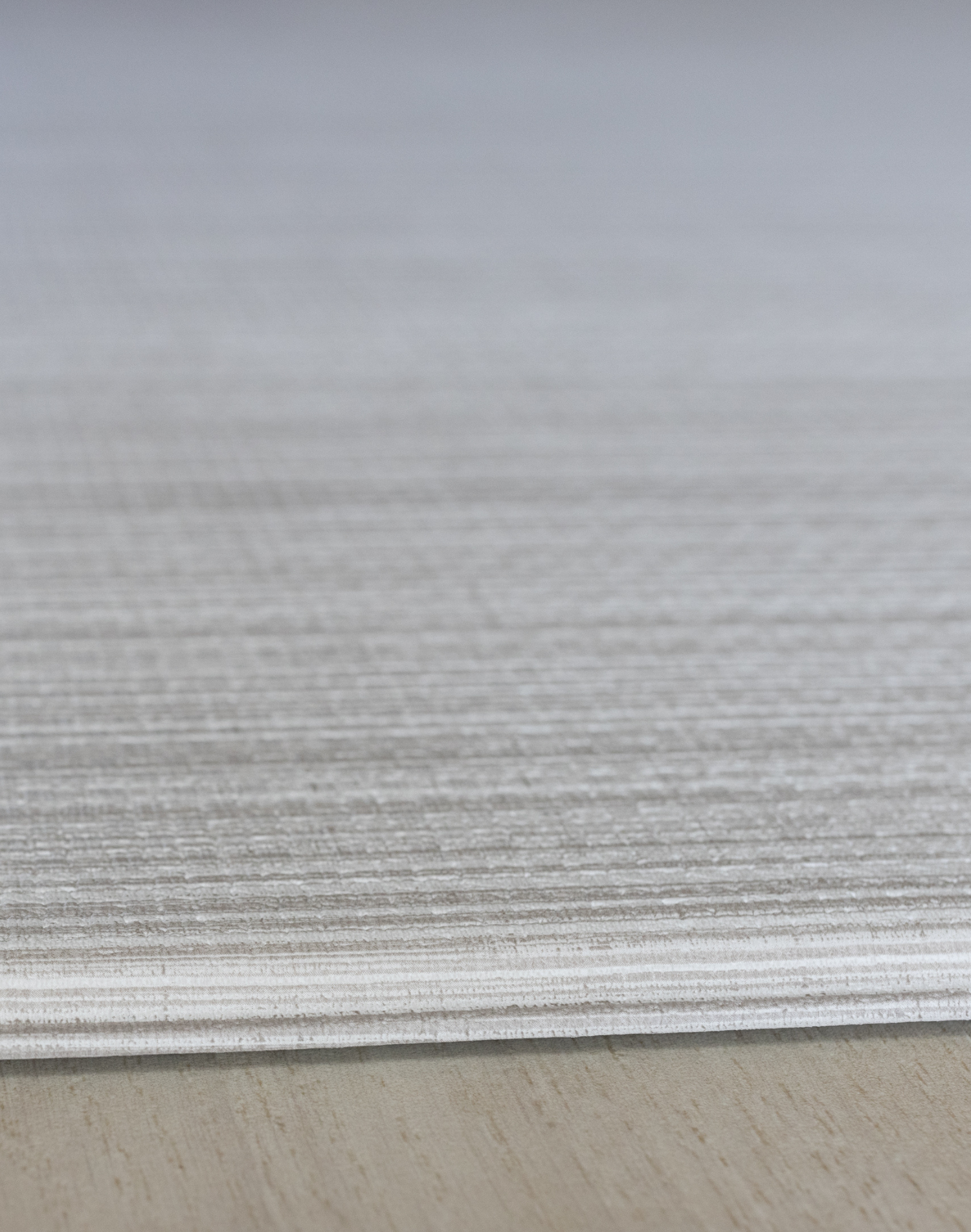 Close up of texture on Baby play mat the whole family will love The Tali has a stylish ombre design with tan and beige tones