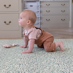 totter and tumble playmats are perfect for newborns and toddlers giving them a safe space to learn to crawl. Morris & Co iconic willow boughs print in leafy green design and warm background makes this playmat feel more like a rug for playing than best baby product