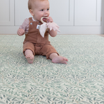 baby teething toy on totter and tumble playmat in collaboration with Morris & co. in heritage willow boughs print one piece playmat for toddlers