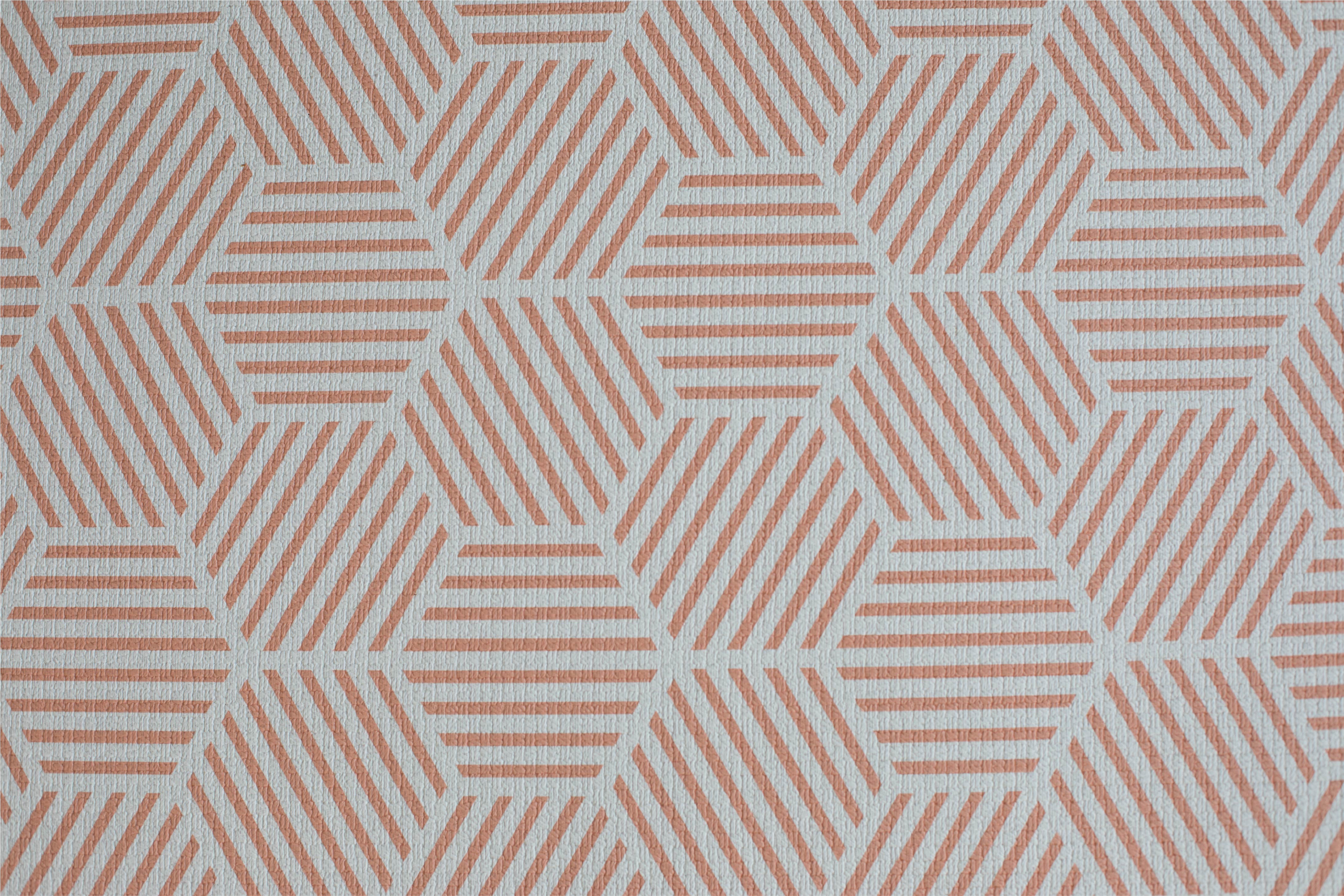 close up of coral hexagon luxury memory foam one piece Totter and Tumble playmat