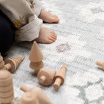 Wooden toys on an anti-slip textured surface great for little ones to play in a safe and stabe place 
