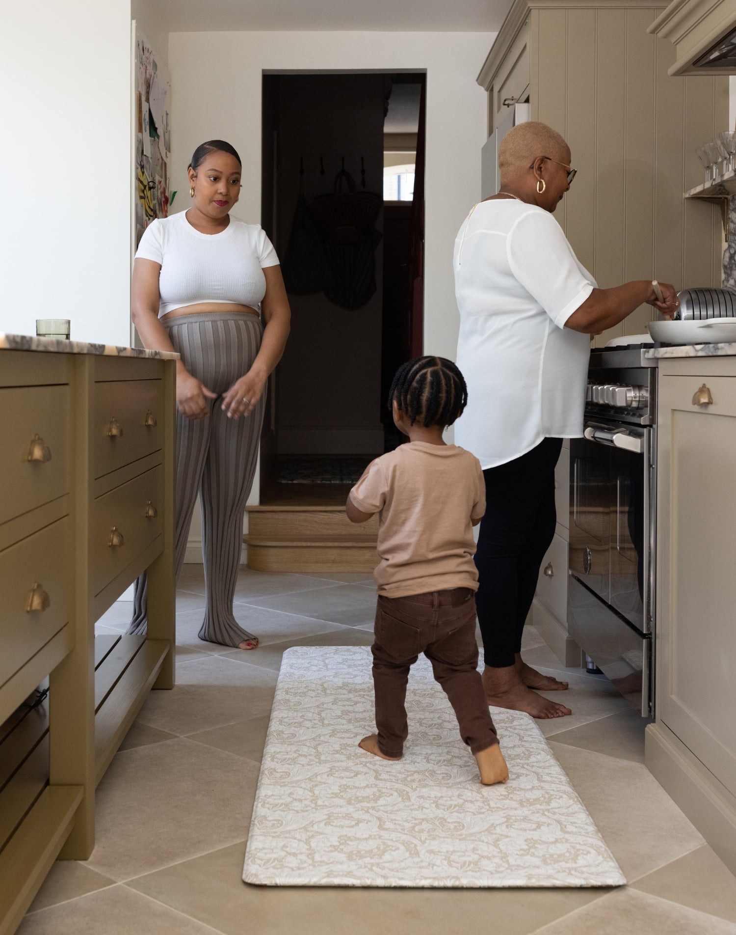 Wipe down kitchen runner mat in family house 