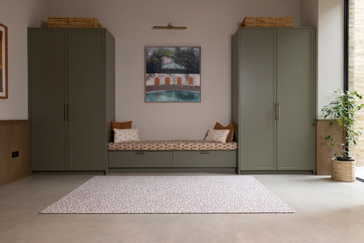 An extra large Brecon Totter + Tumble playmat in a family space