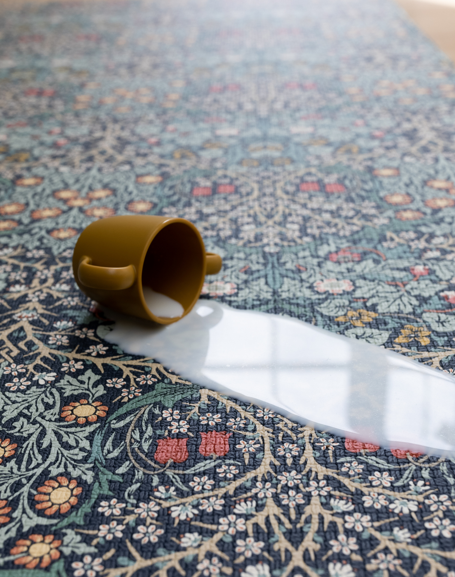 blackthorn playmat with spilled milk no worries waterproof playmat is wipedown and easy to clean 