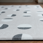 Close up of textured baby play mat with a modern polka design for a stylish effect 