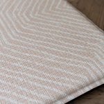 Textured surface on non slip playmat with pink kilim rug design 