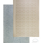 A neutral tone playmat that looks like a large rug for baby nurseries. On the reverse is a soft seagrass blue design.