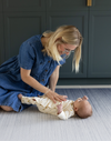 Mum and baby enjoying Ombre blue baby play mat made for support on the floor perfect for tummy time and playing stylish design looks great in modern interiors 