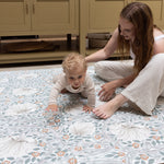 parent and child enjoying kitchen playmat