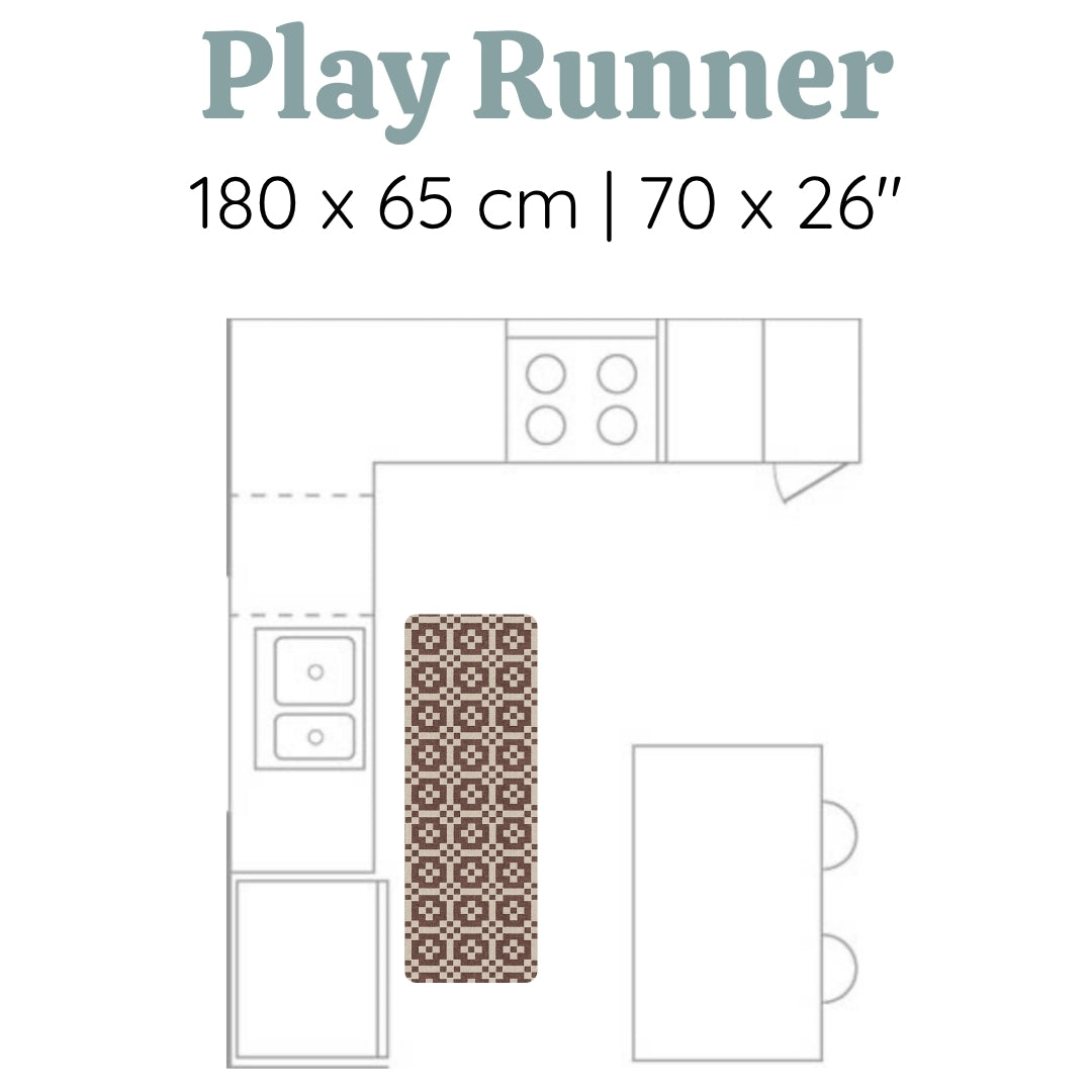 A Totter + Tumble play runner in a kitchen space. A soft squidgy mat for elegant family spaces.