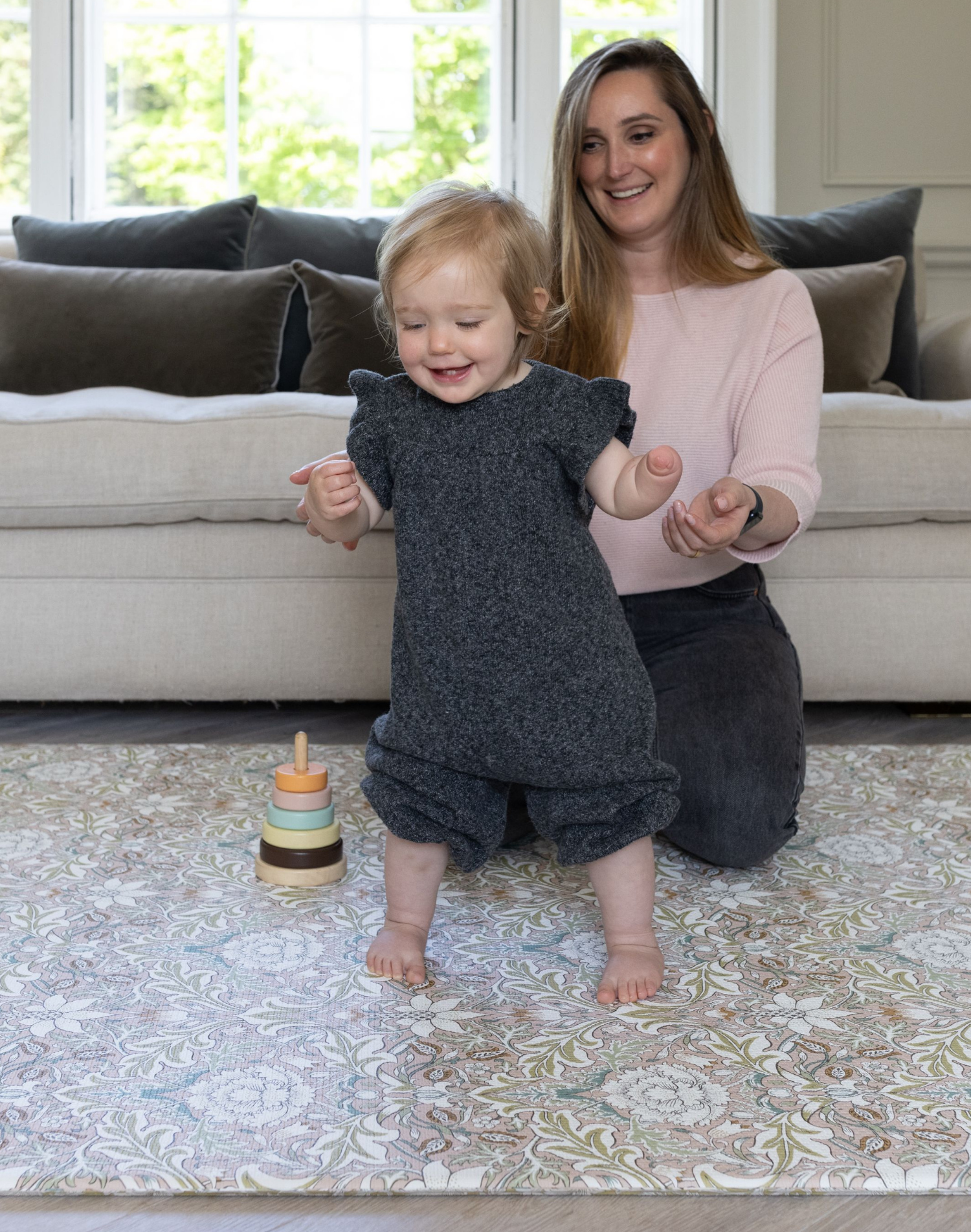 mum and toddler playing on totter and tumble collaborations william morris & co play mat reversible designs severn in floral morris print play mat rugs non toxic playmats suitable from newborn and designed with the whole family in mind