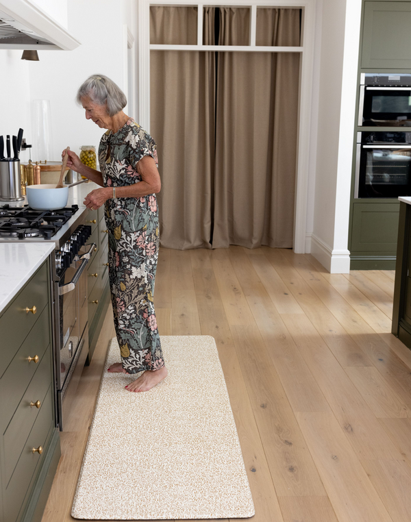 totter and tumble play runner is used by grandparent cooking in the kitchen as a standing mat, great for anti fatigue mats for all ages supportive memory foam cushions and protects floor underneath, washable rugs with just a quick and easy wipedown clean