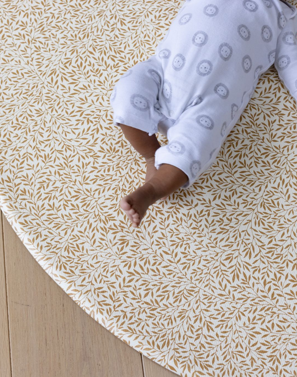 totter + tumble warm mustard playmat in standen print from william morris collaboration playmats for babies and children playing on 