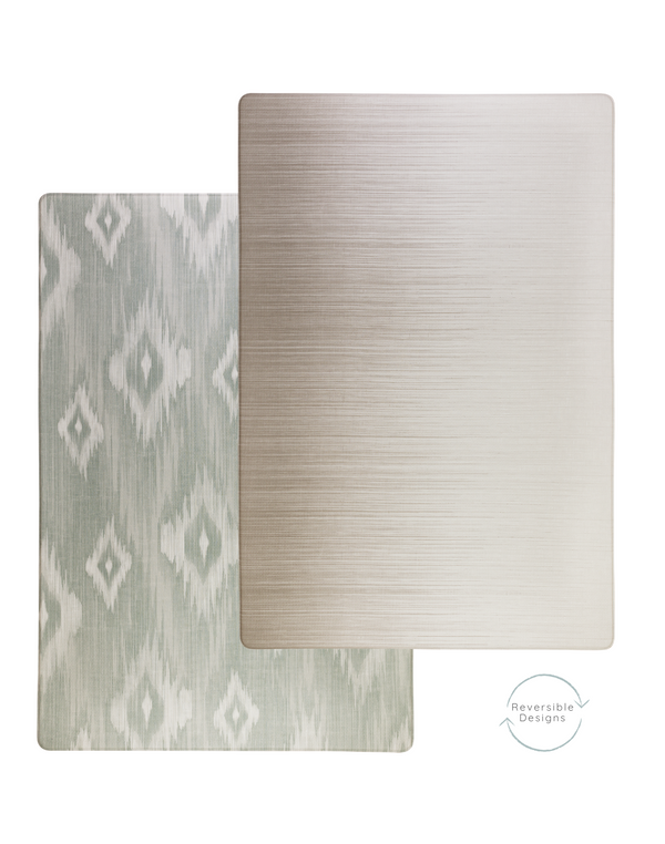Double sided neutral playmat with ikat inspired motifs for a textile effect