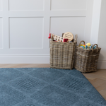 Kilim play rug by Totter and Tumble in a stylish teal shade so your family home can be stylish and practical