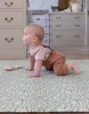 totter and tumble playmats are perfect for newborns and toddlers giving them a safe space to learn to crawl. Morris & Co iconic willow boughs print in leafy green design and warm background makes this playmat feel more like a rug for playing than best baby product