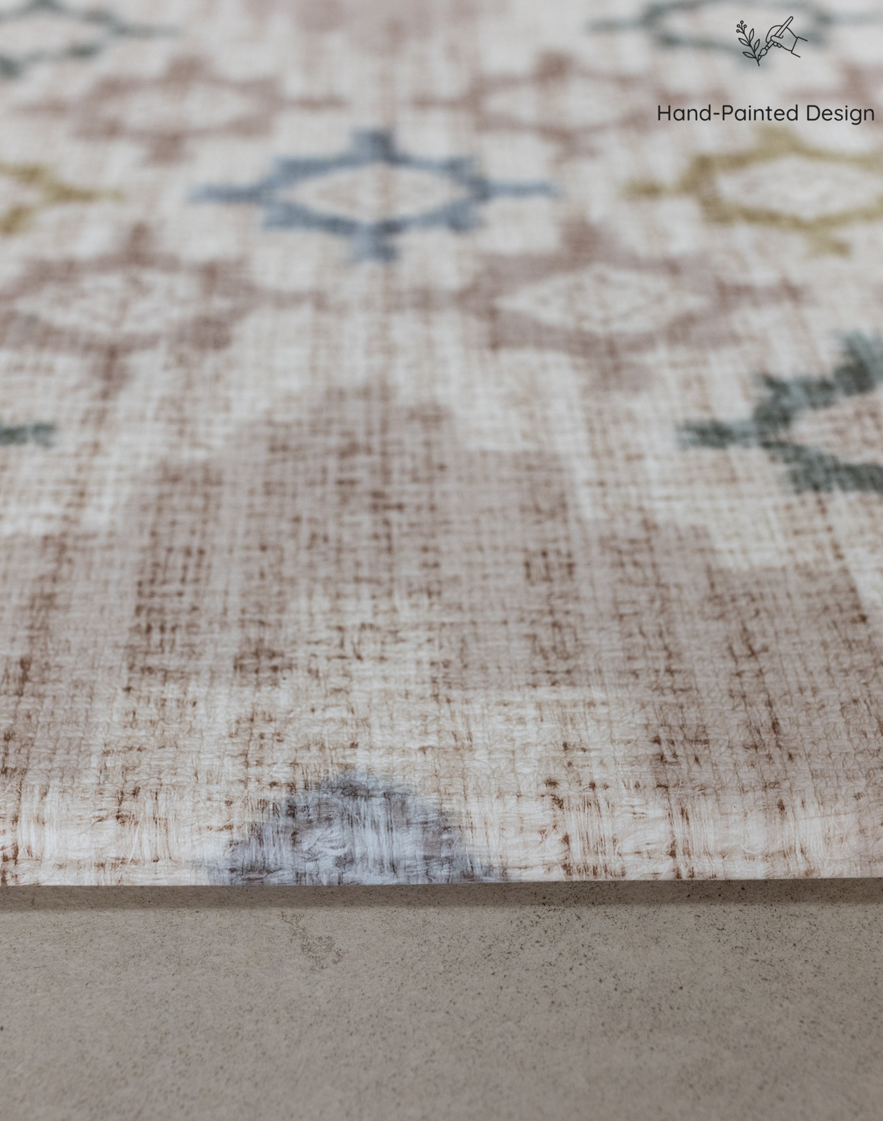 Close-up of a textured non slip Totter and Tumble playmat with geometric pattern on a neutral background