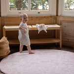 round playmat suitable from birth with baby practising walking skills great for practising those developmental milestones 