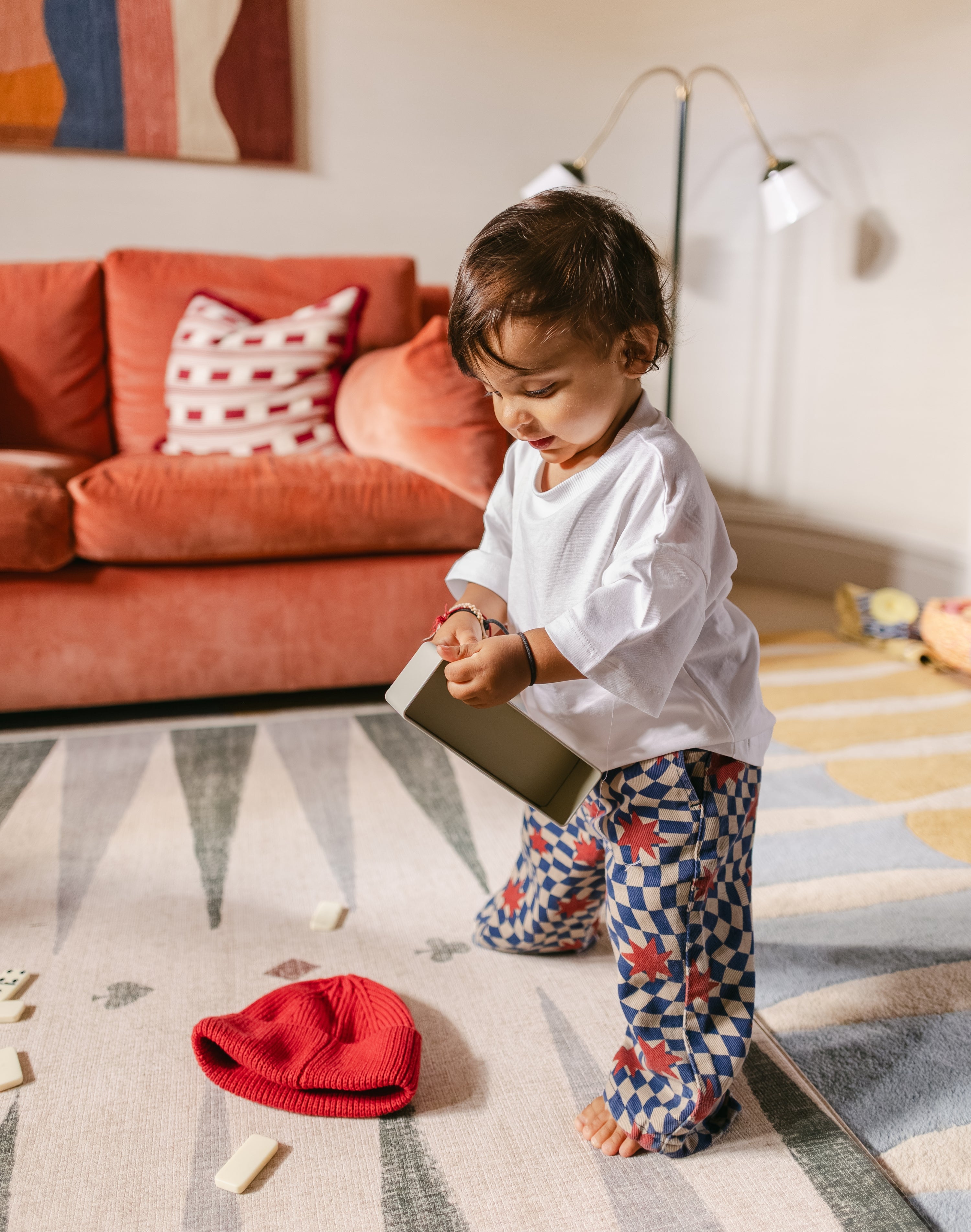 Baby playing on The Counter, Totter + Tumble wipeable and reversible memory foam playmat