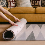 Rolling up The Counter, Totter + Tumble wipeable and reversible memory foam playmat