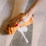 Wipe spillage on The Counter, Totter + Tumble wipeable and reversible memory foam playmat