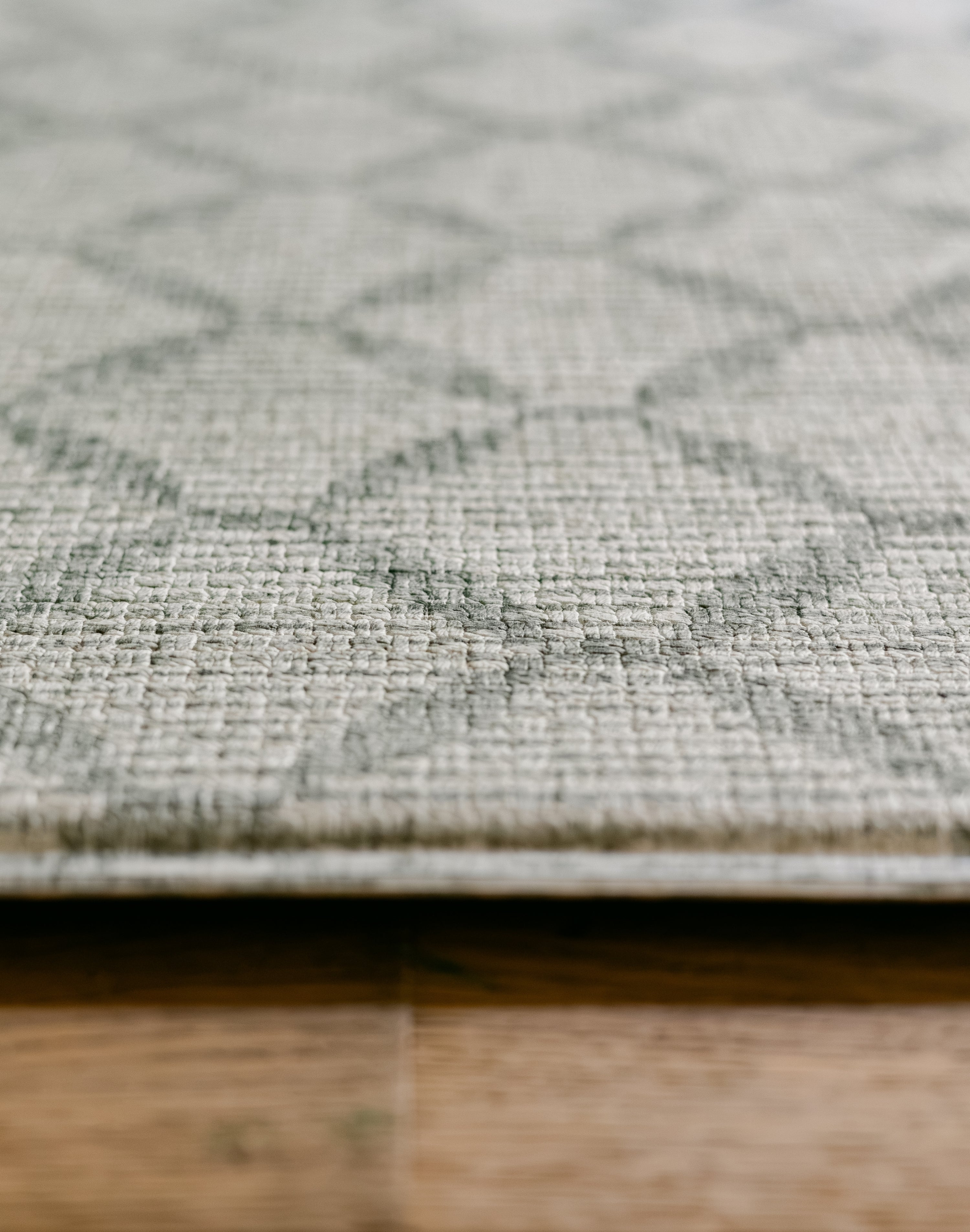 Close-up the gatherer playmat in thick memory foam with geometric trellis pattern