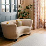 The Gatherer rug-like playmat in a living room 