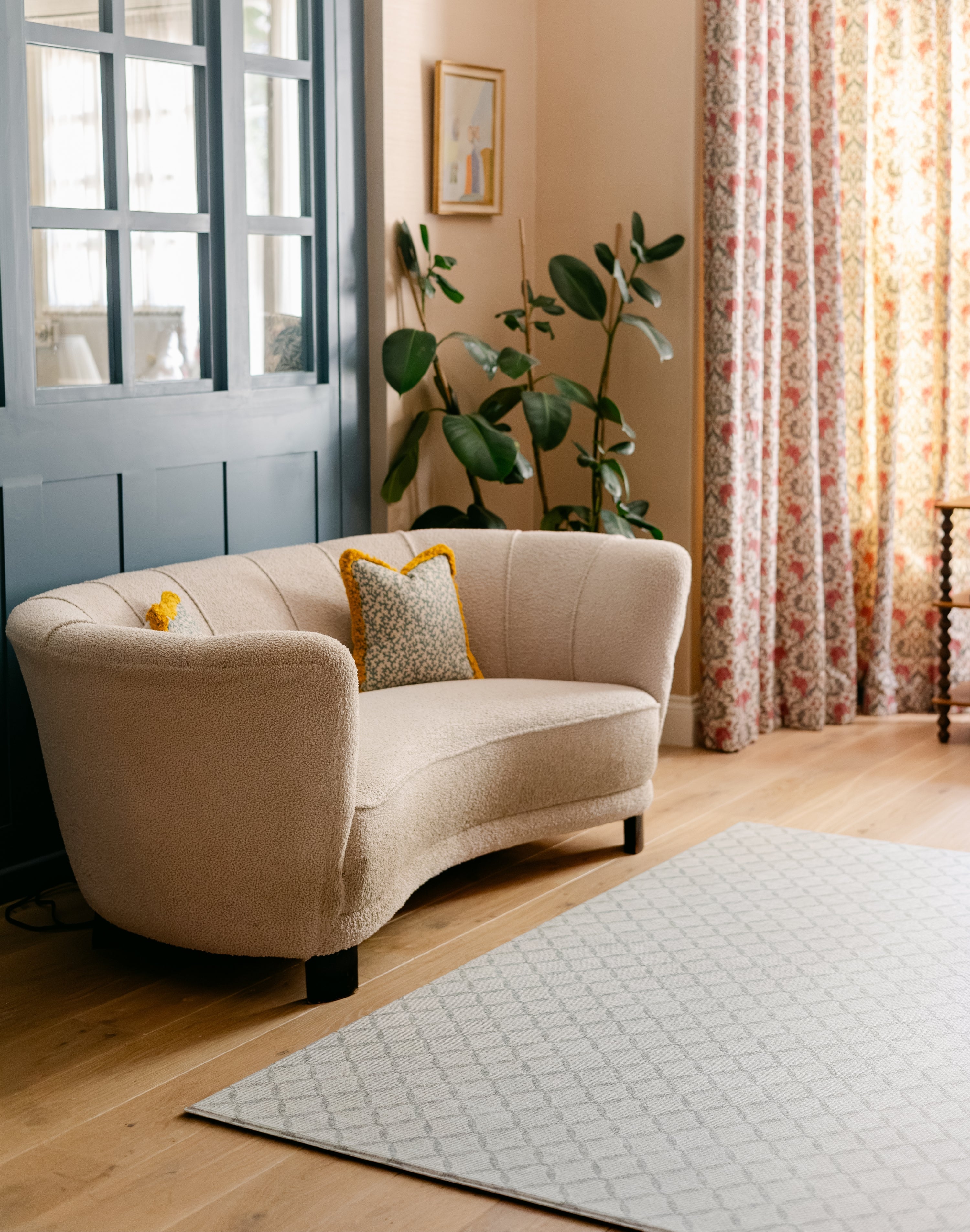 The Gatherer rug-like playmat in a living room 