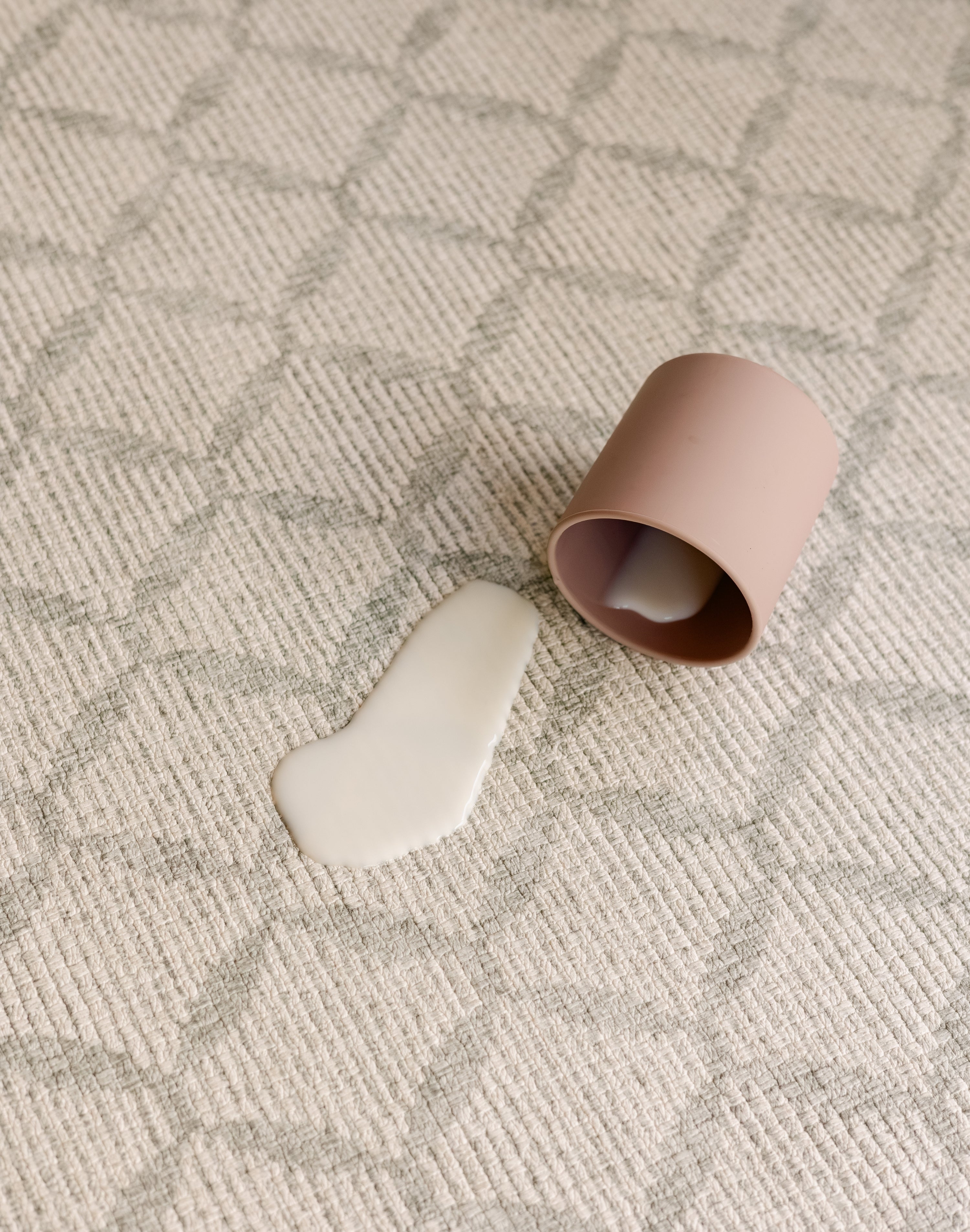 Spilt milk on the easy to clean gatherer playmat from totter and tumble, non toxic and made from thick memory foam