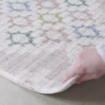 Video of reversible onepiece playmat from totter and tumble