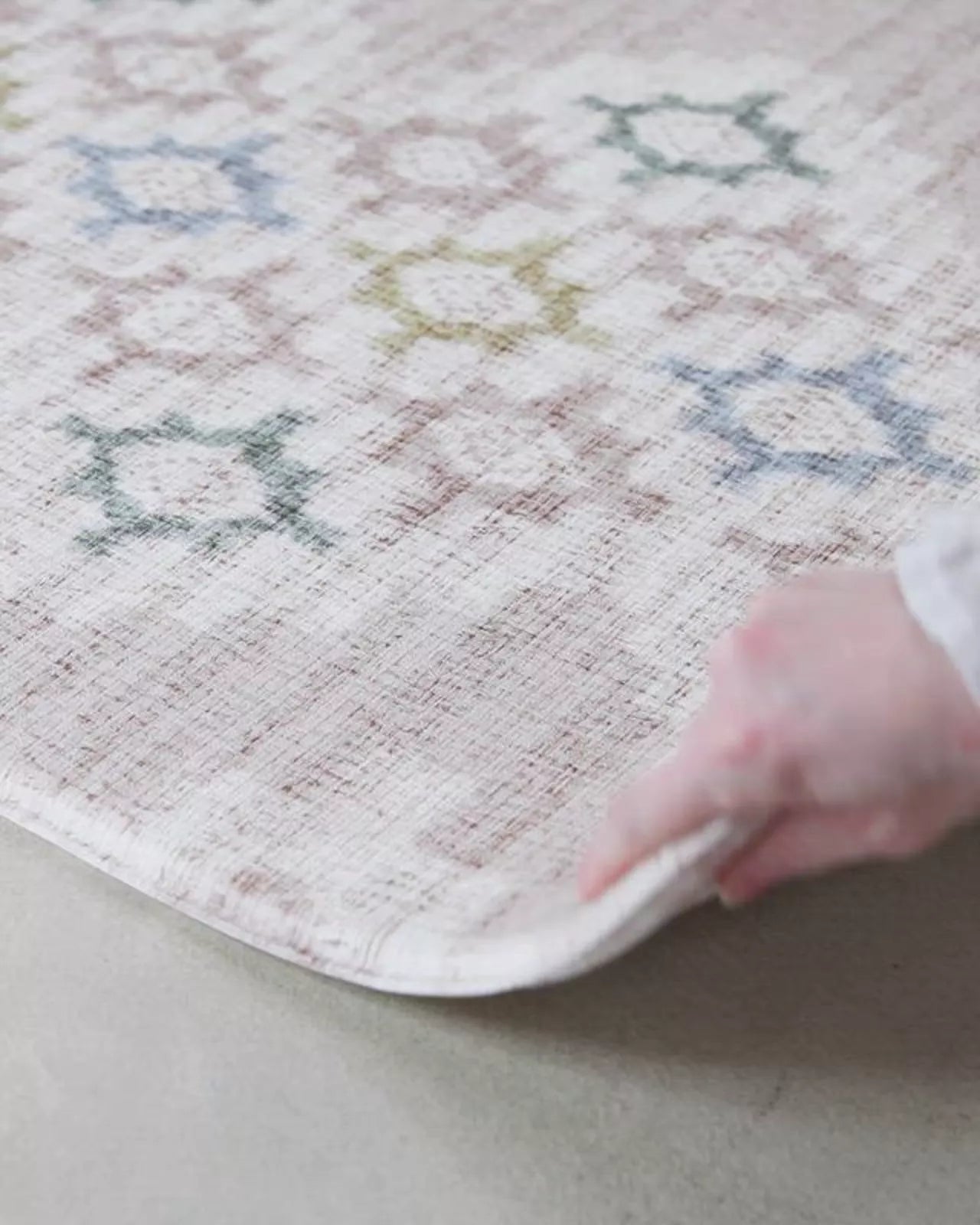 Video of reversible onepiece playmat from totter and tumble