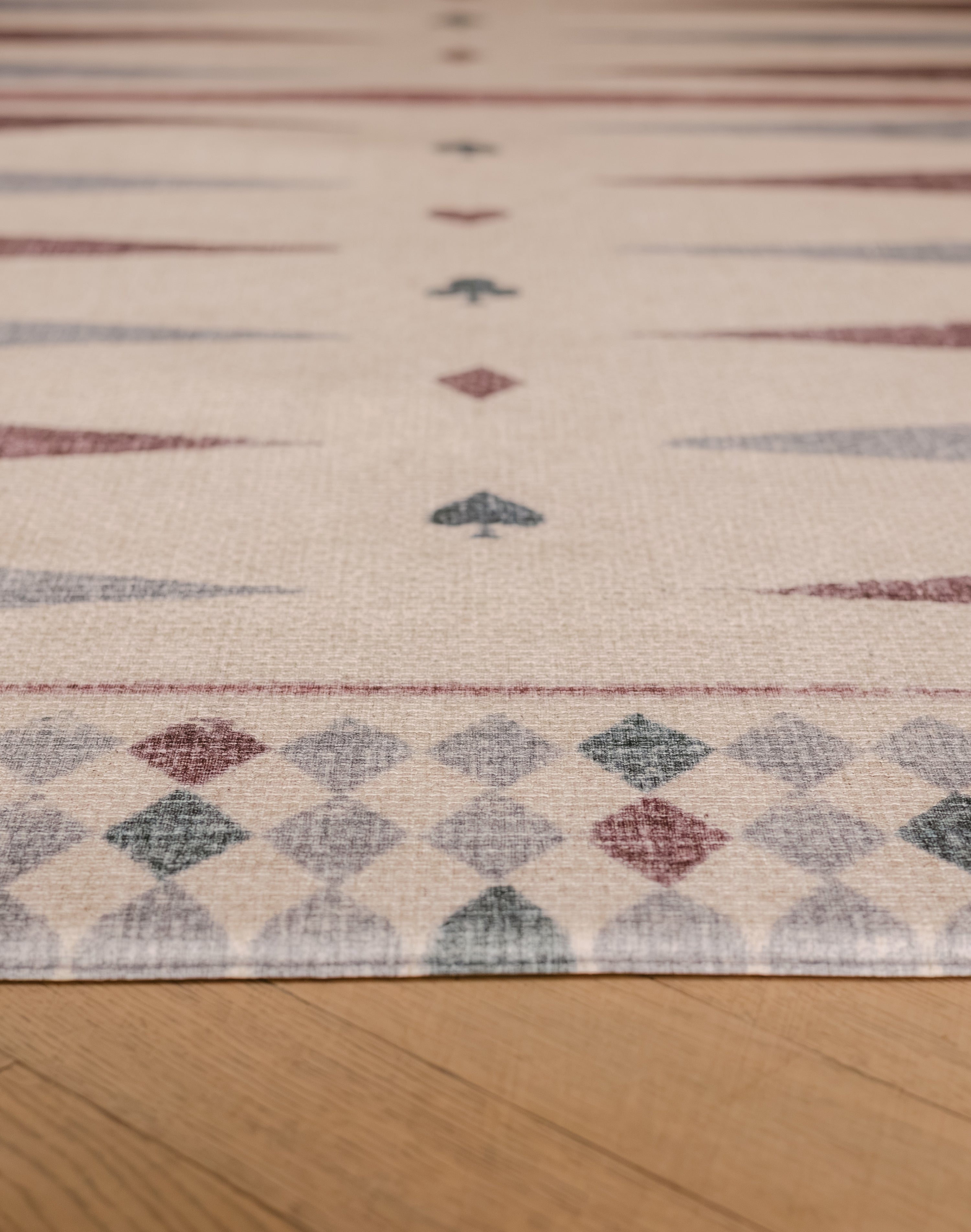 The edge of The Roller Playmat by Totter + Tumble, the biggest one piece playmat on the market