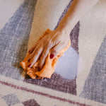 Milk wiped from The Roller Playmat by Totter + Tumble, the biggest one piece playmat on the market, reversible and memory foam