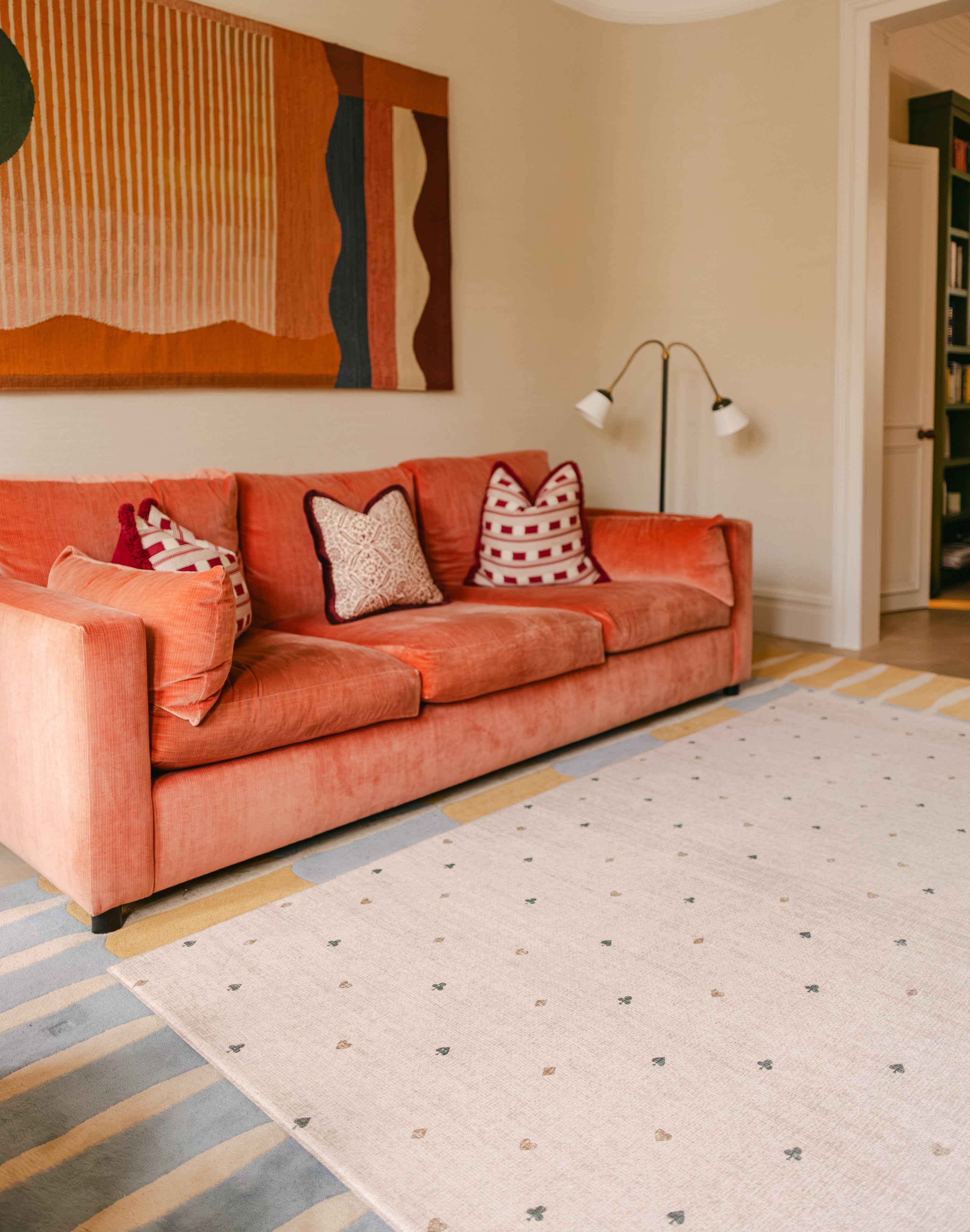 The Wildcard Totter + Tumble reversible wipeable memory foam playmat in a bright stylish living room